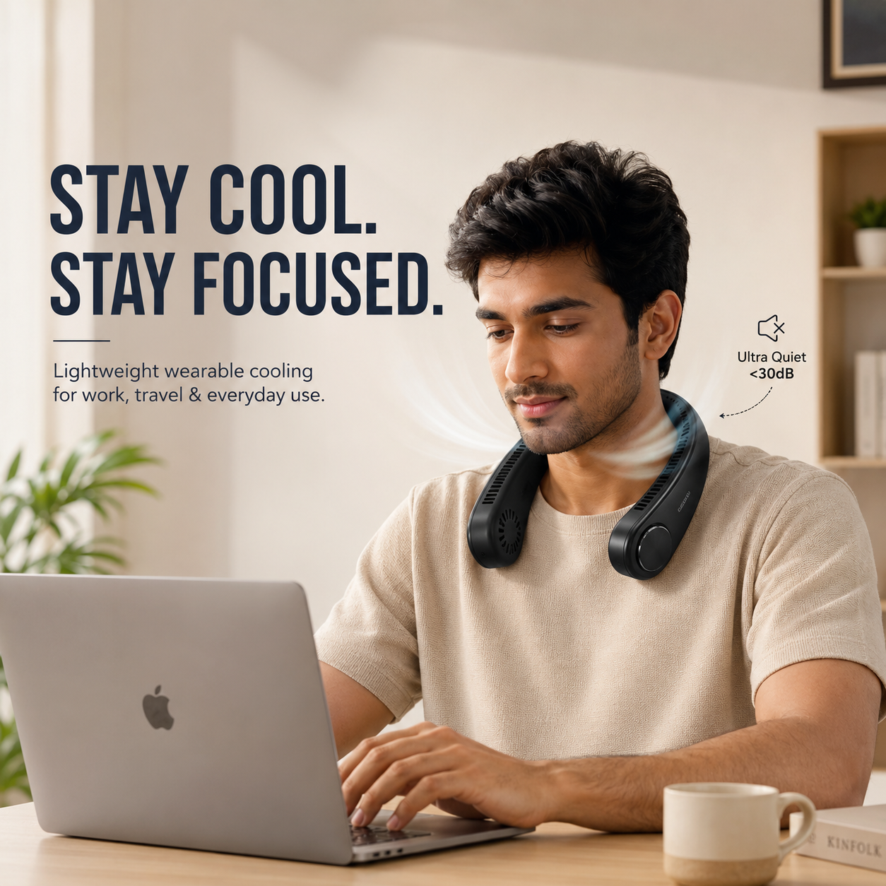 Man using a laptop with a cooling device around his neck, text 'Stay Cool. Stay Focused.'